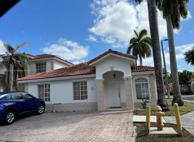 a view of a house with a patio