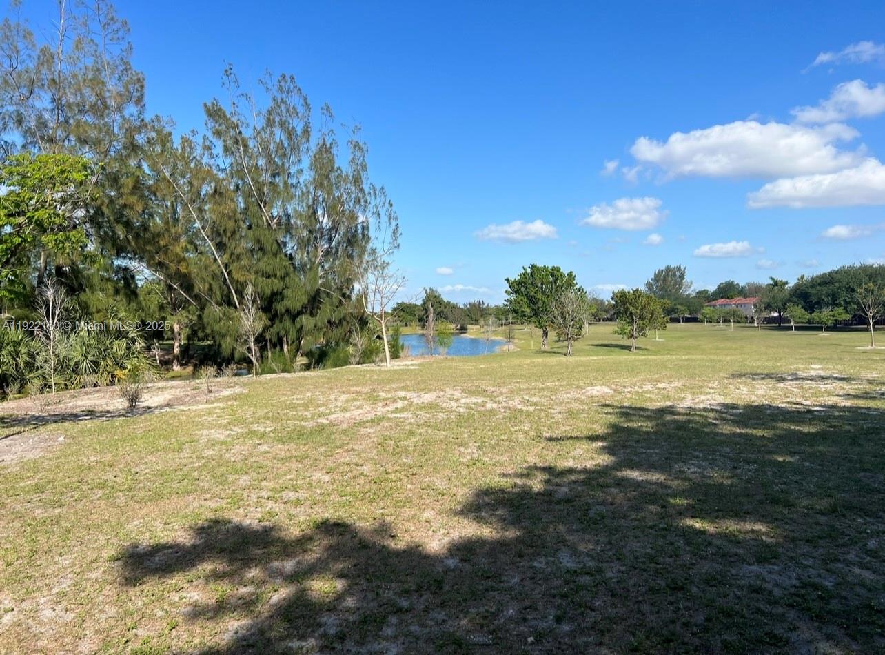 7317 Northwest 173rd Drive, Unit 104 Hialeah, FL 33015 - Photo 22 of 22 a view of an ocean and a yard