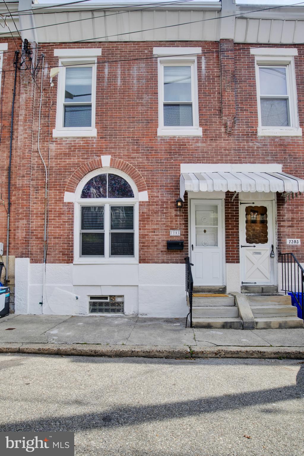 7205 Howard Terrace Philadelphia, PA 19119 - Photo 3 of 23 a front view of a house with stairs
