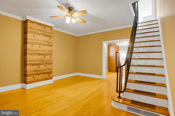 a view of entryway with wooden floor