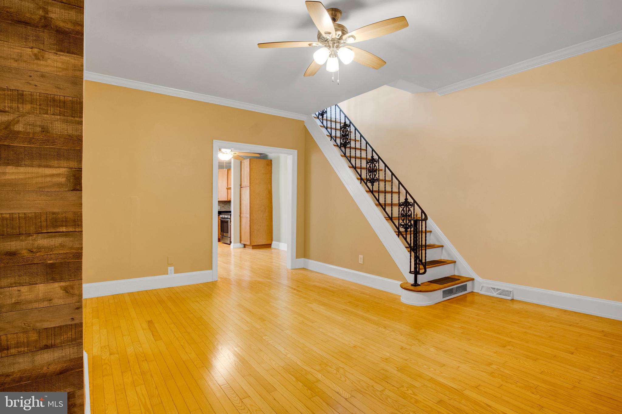 7205 Howard Terrace Philadelphia, PA 19119 - Photo 7 of 23 a view of a hallway with wooden floor