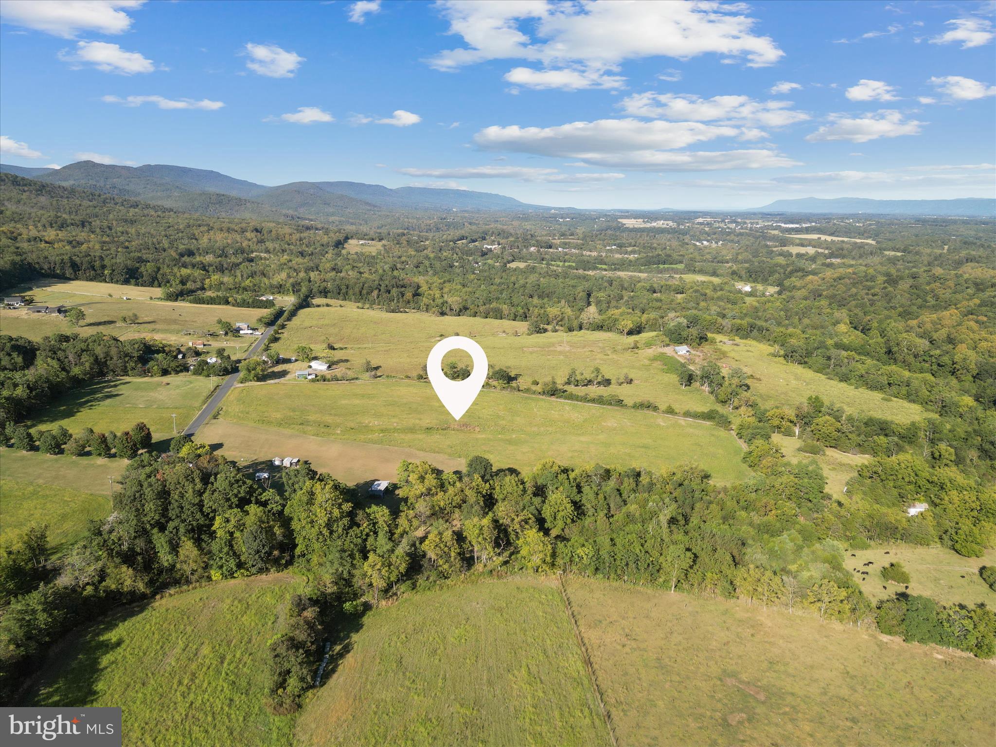 Ridge Hollow Road Edinburg, VA 22824 - Photo 4 of 17 a view of a lake with a mountain