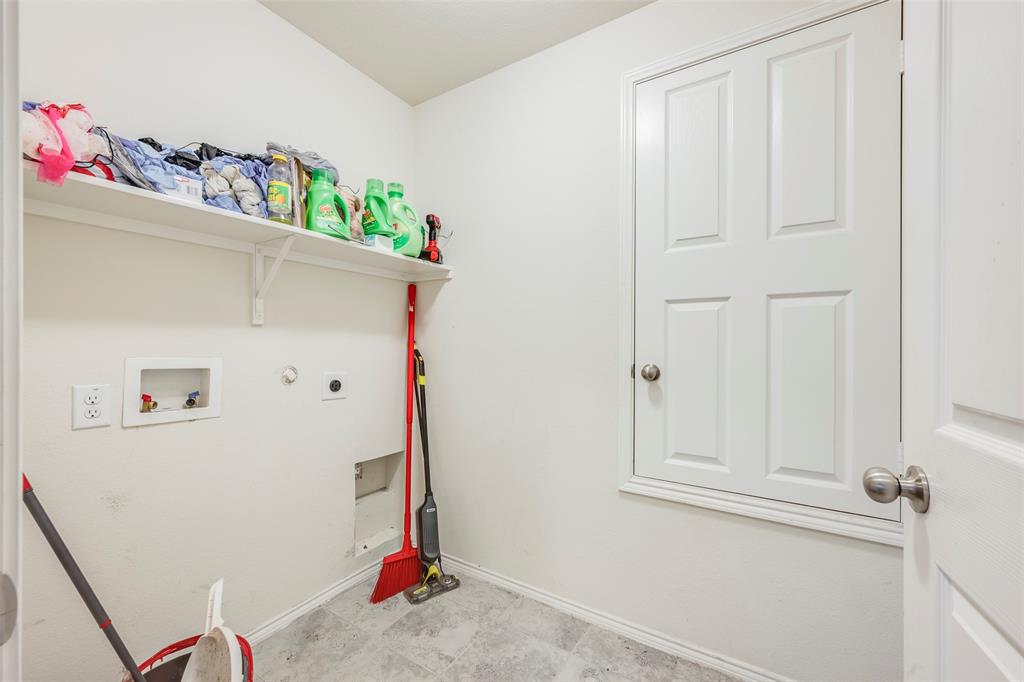 1062 Spofford Drive Forney, TX 75126 - Photo 15 of 23 a room with storage and utility