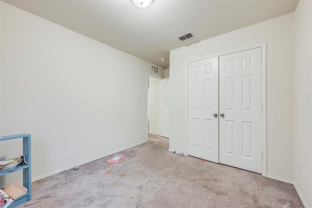 1062 Spofford Drive Forney, TX 75126 - Photo 18 of 23 a view of an empty room