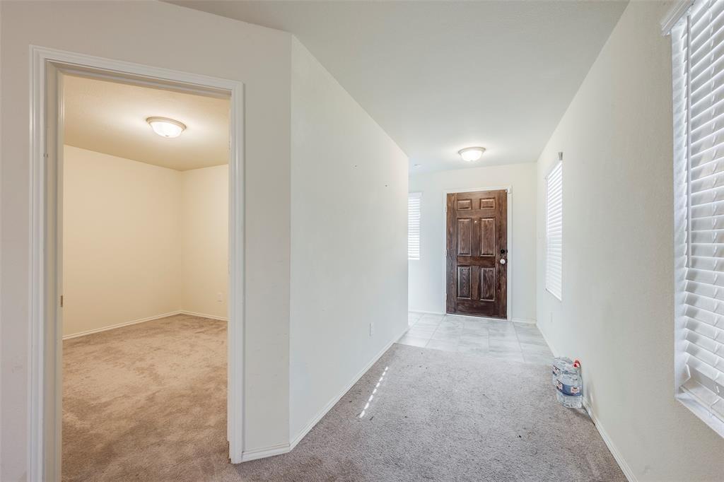 1062 Spofford Drive Forney, TX 75126 - Photo 3 of 23 a view of hallway with livingroom