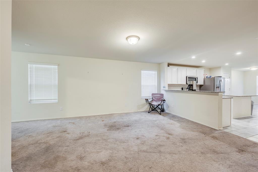 1062 Spofford Drive Forney, TX 75126 - Photo 5 of 23 a view of a kitchen and a sink