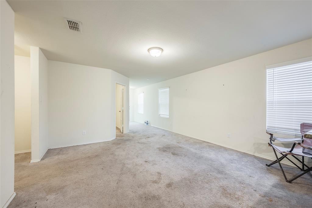 1062 Spofford Drive Forney, TX 75126 - Photo 6 of 23 a view of an empty room