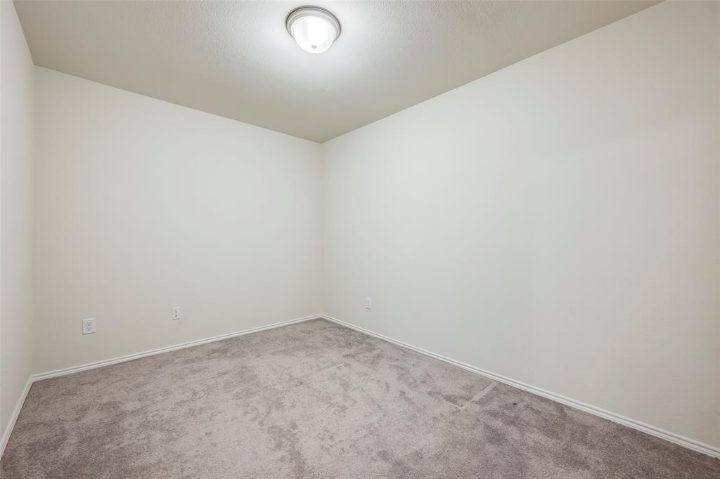 1062 Spofford Drive Forney, TX 75126 - Photo 7 of 23 a view of an empty room
