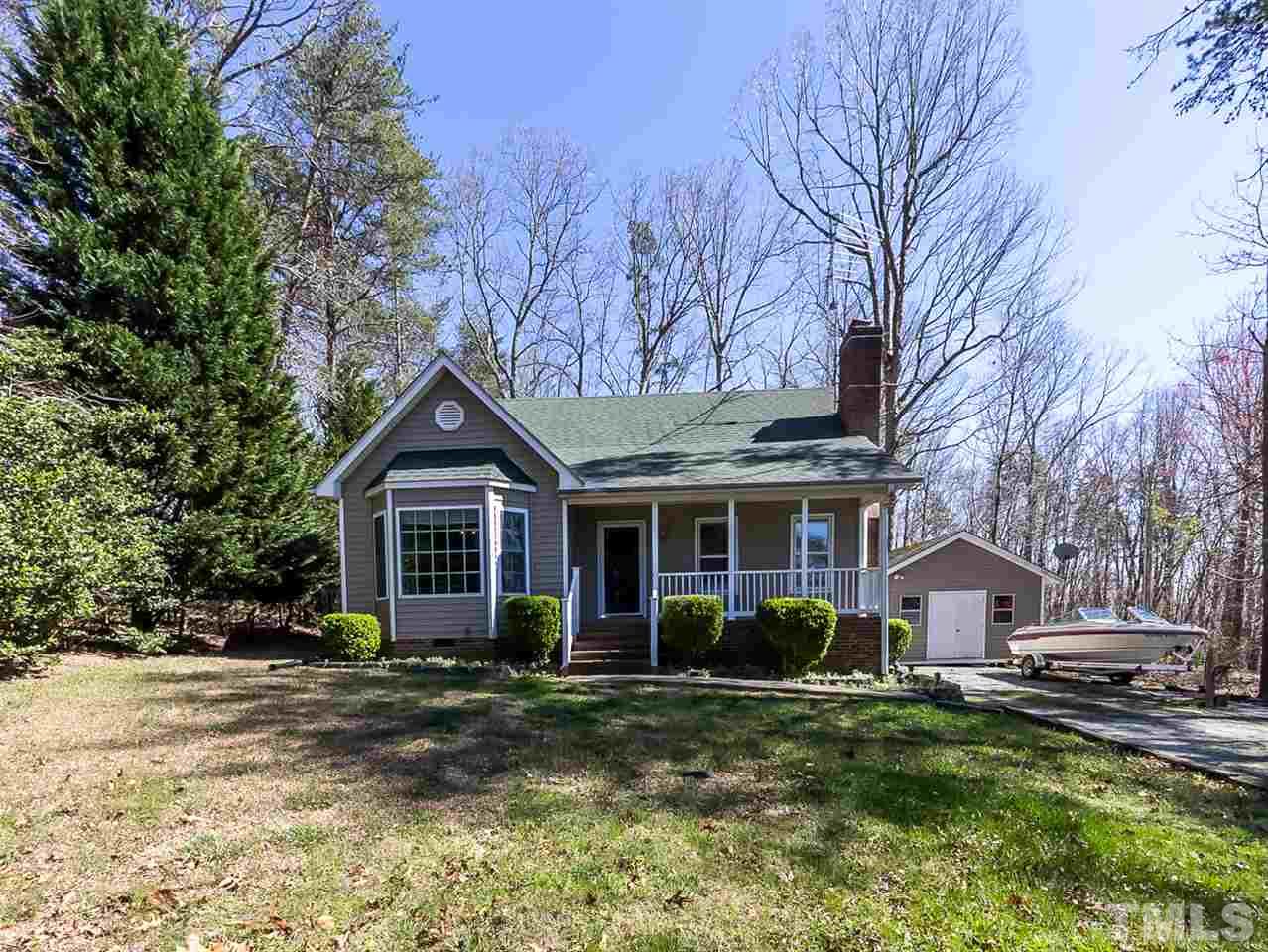 3518 Moriah Road Rougemont, NC 27572 - Photo 2 of 25 a front view of house with yard and green space