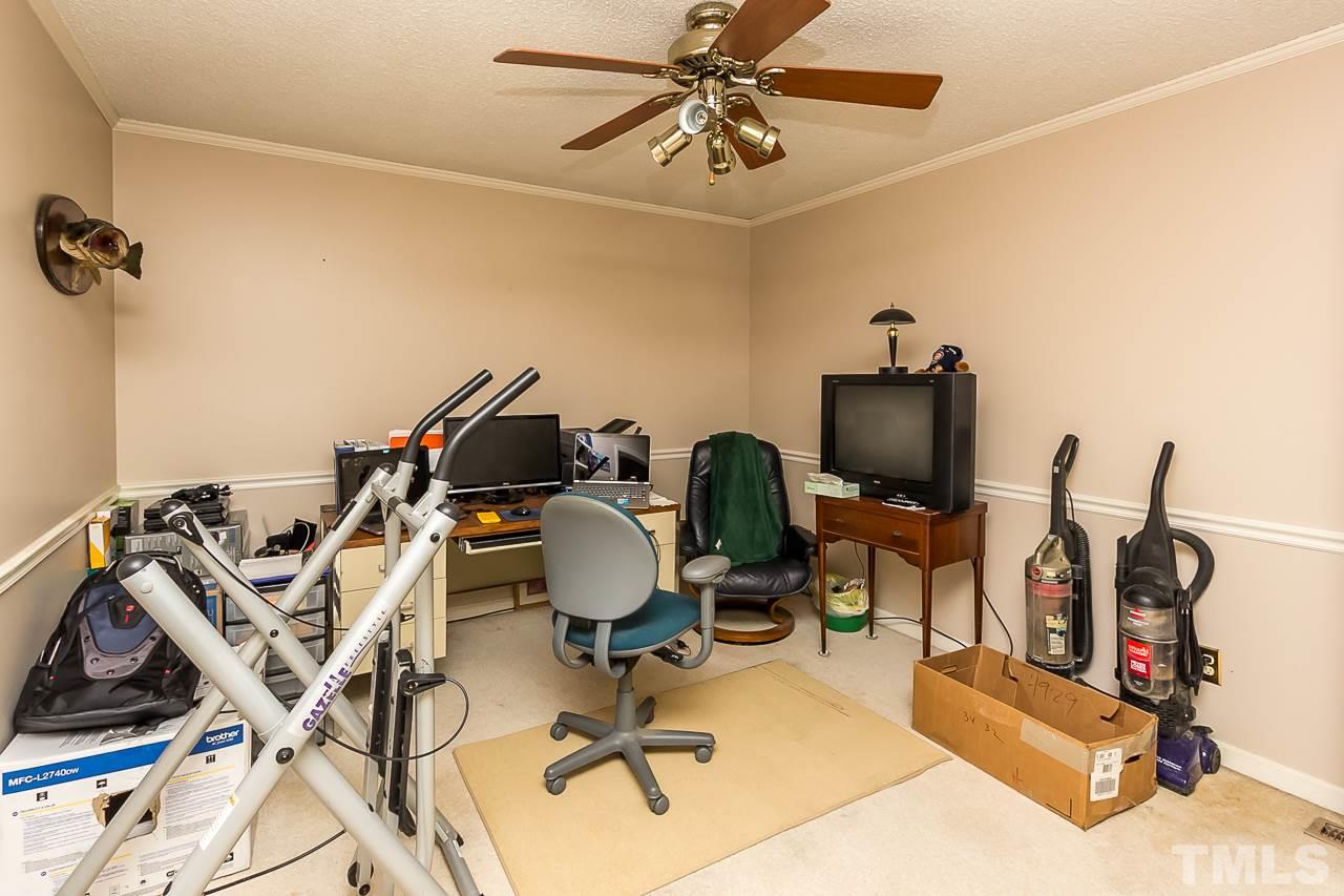 3518 Moriah Road Rougemont, NC 27572 - Photo 18 of 25 a view of a workspace with furniture and gym equipment