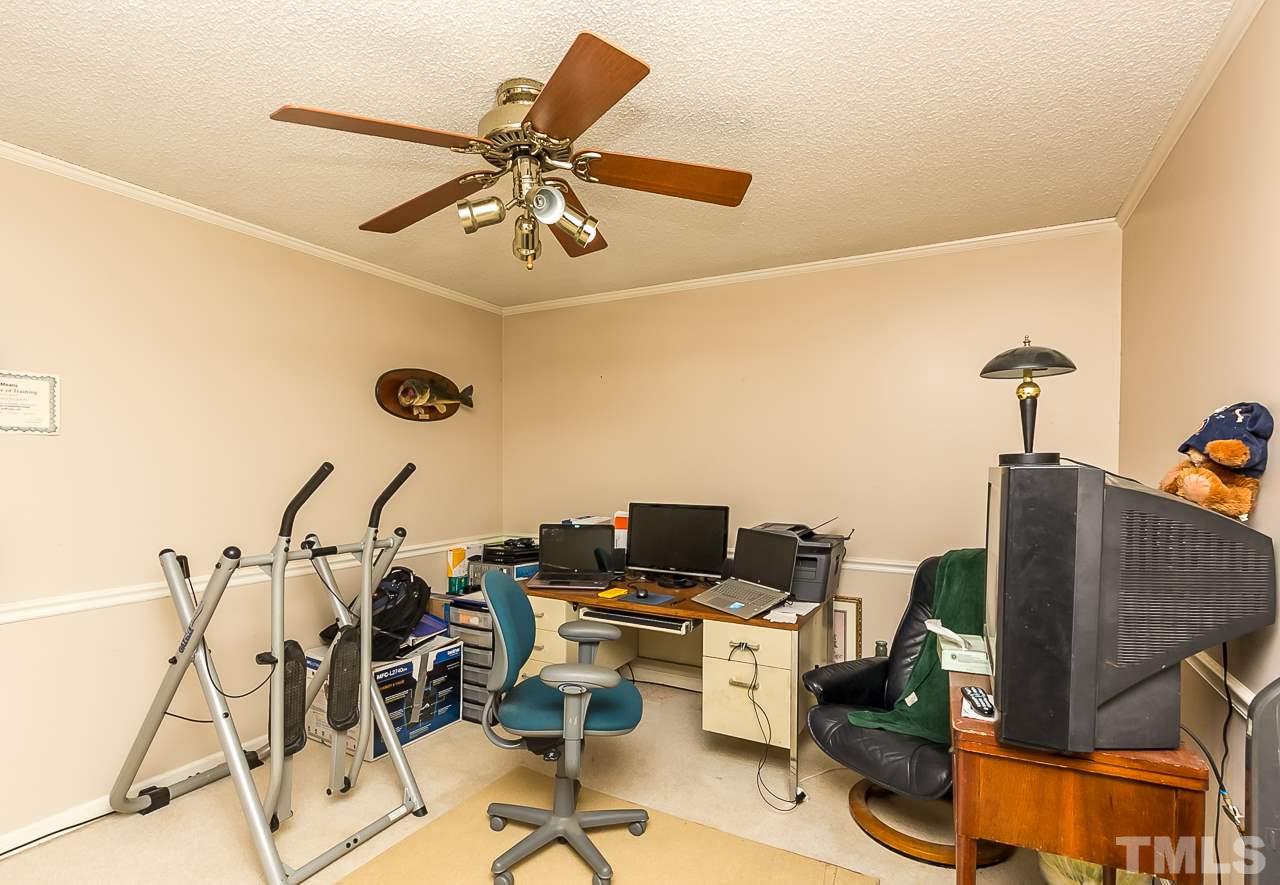3518 Moriah Road Rougemont, NC 27572 - Photo 19 of 25 a workspace with furniture and wooden floor
