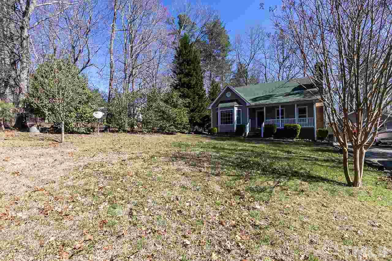 3518 Moriah Road Rougemont, NC 27572 - Photo 22 of 25 a view of a house with a yard