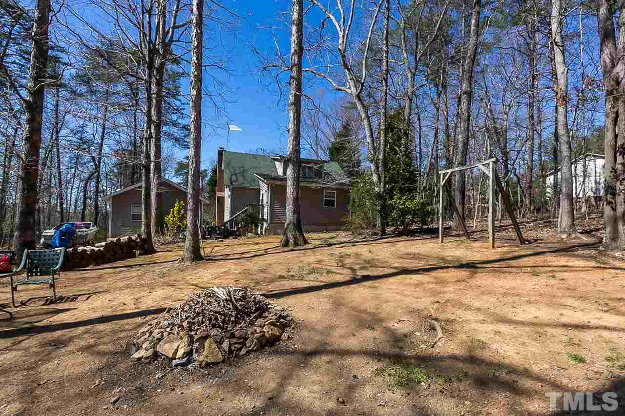 3518 Moriah Road Rougemont, NC 27572 - Photo 23 of 25 a view of a house with snow on the road