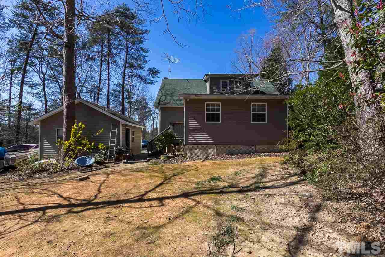3518 Moriah Road Rougemont, NC 27572 - Photo 24 of 25 a view of a house with yard and sitting area