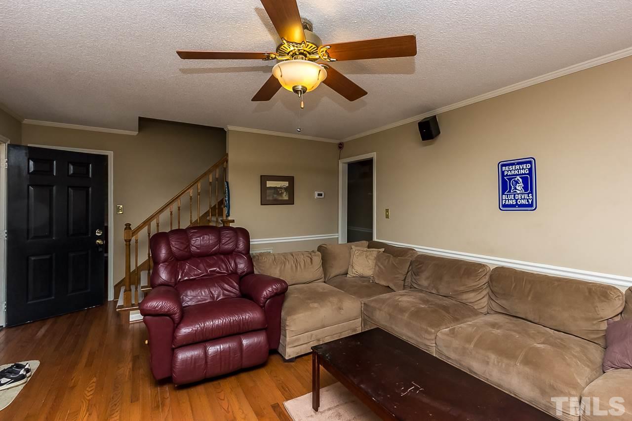 3518 Moriah Road Rougemont, NC 27572 - Photo 4 of 25 a living room with furniture and a ceiling fan