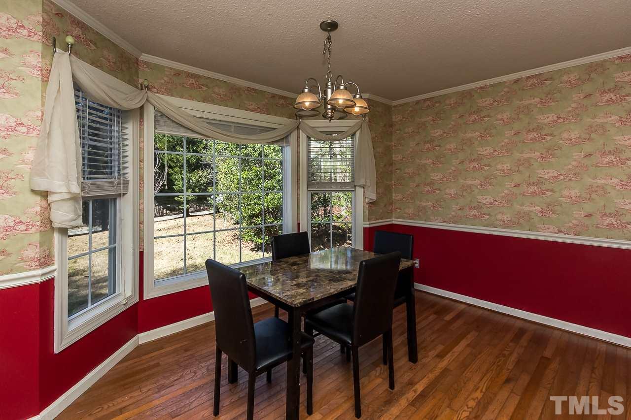 3518 Moriah Road Rougemont, NC 27572 - Photo 7 of 25 a view of a dining room with furniture window and wooden floor