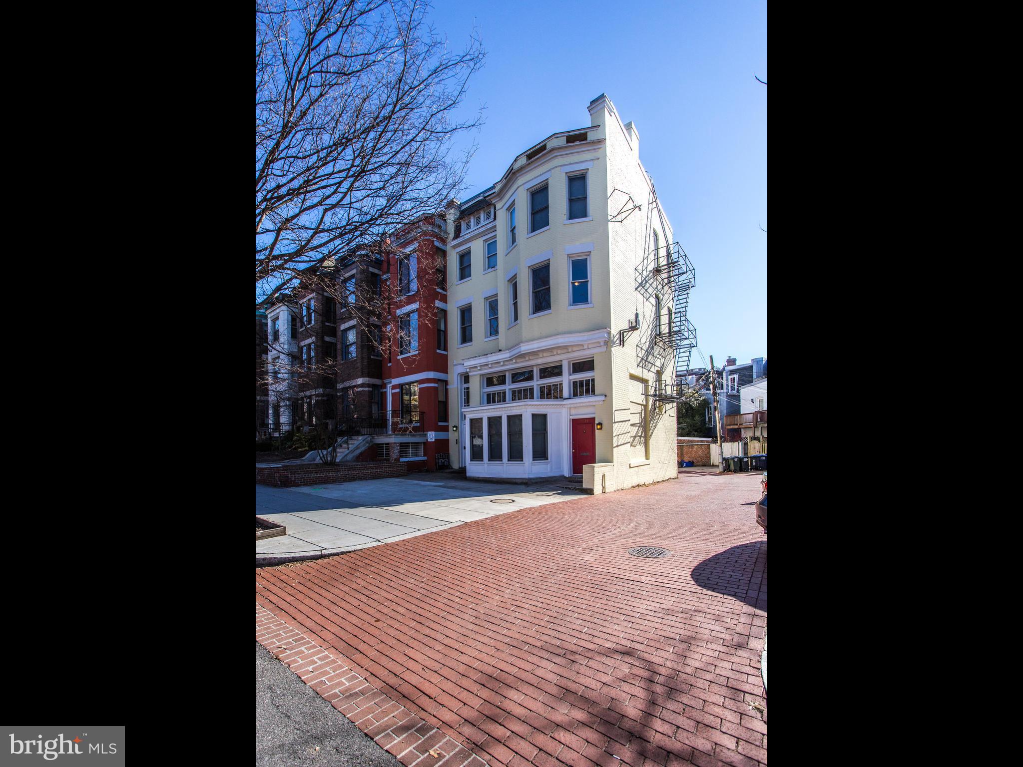 a view of building with a street