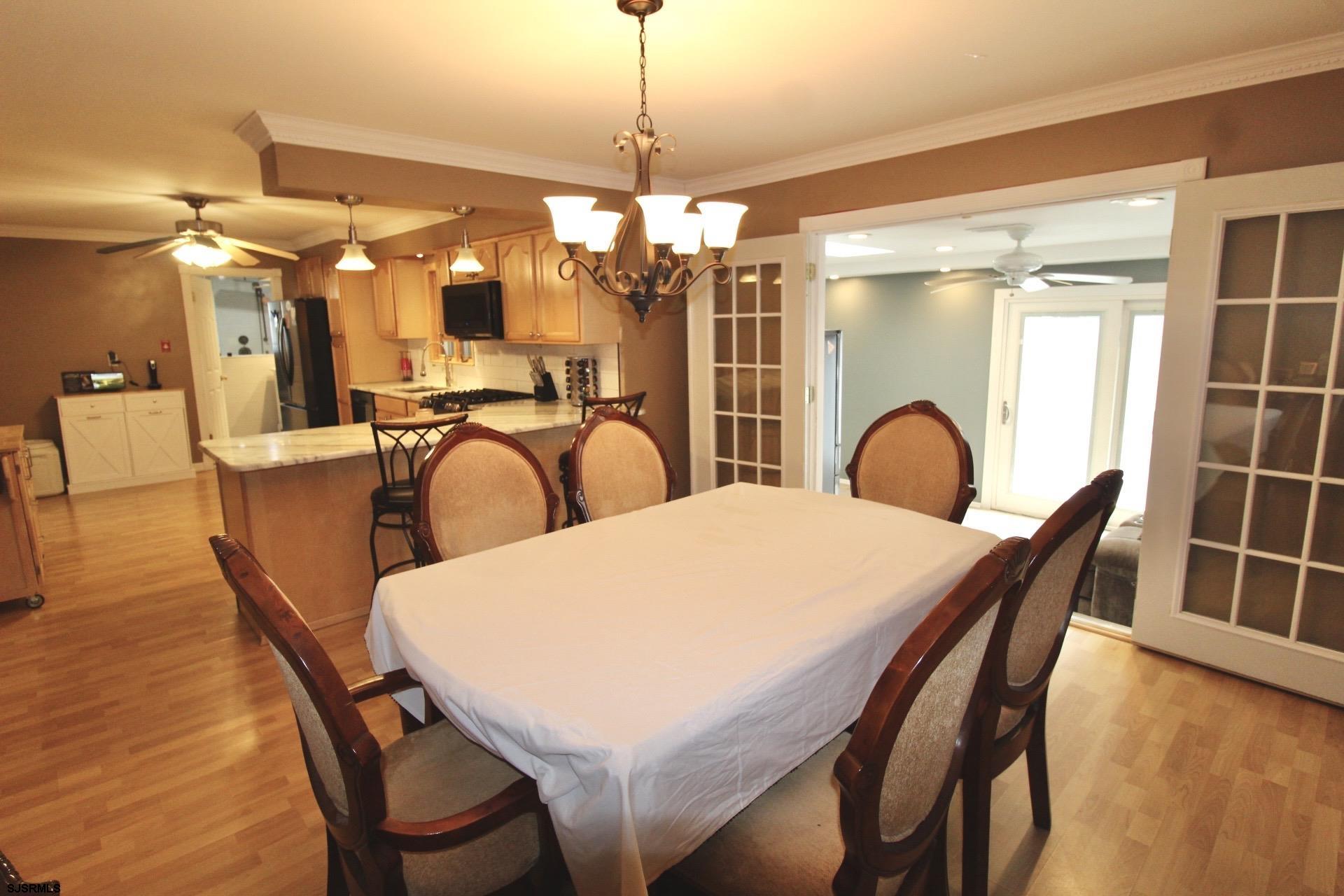 107 Spray Avenue Egg Harbor Township, NJ 08234 - Photo 12 of 38 a dining room with furniture and window