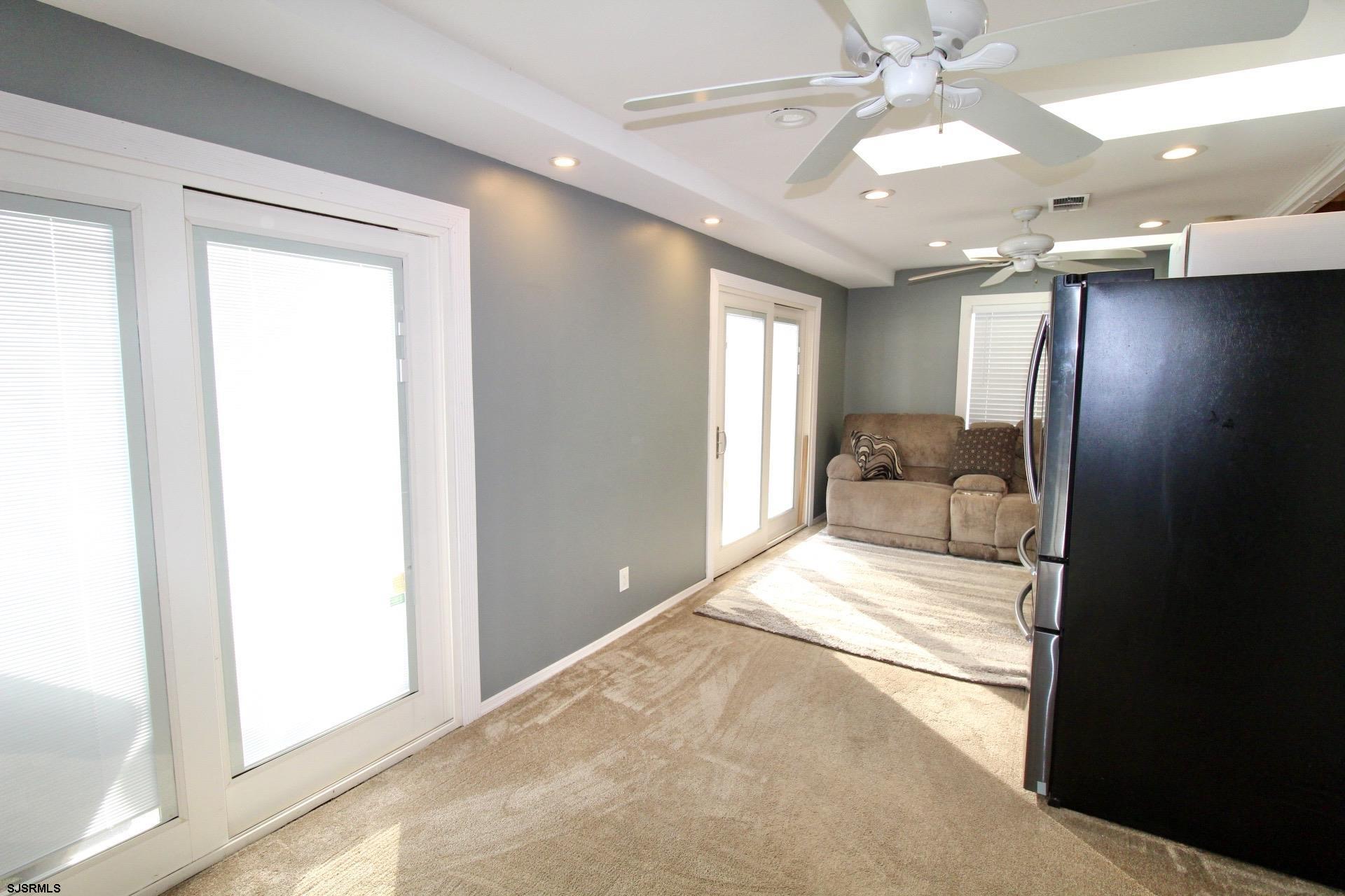 107 Spray Avenue Egg Harbor Township, NJ 08234 - Photo 15 of 38 a view of a hallway with furniture and a window
