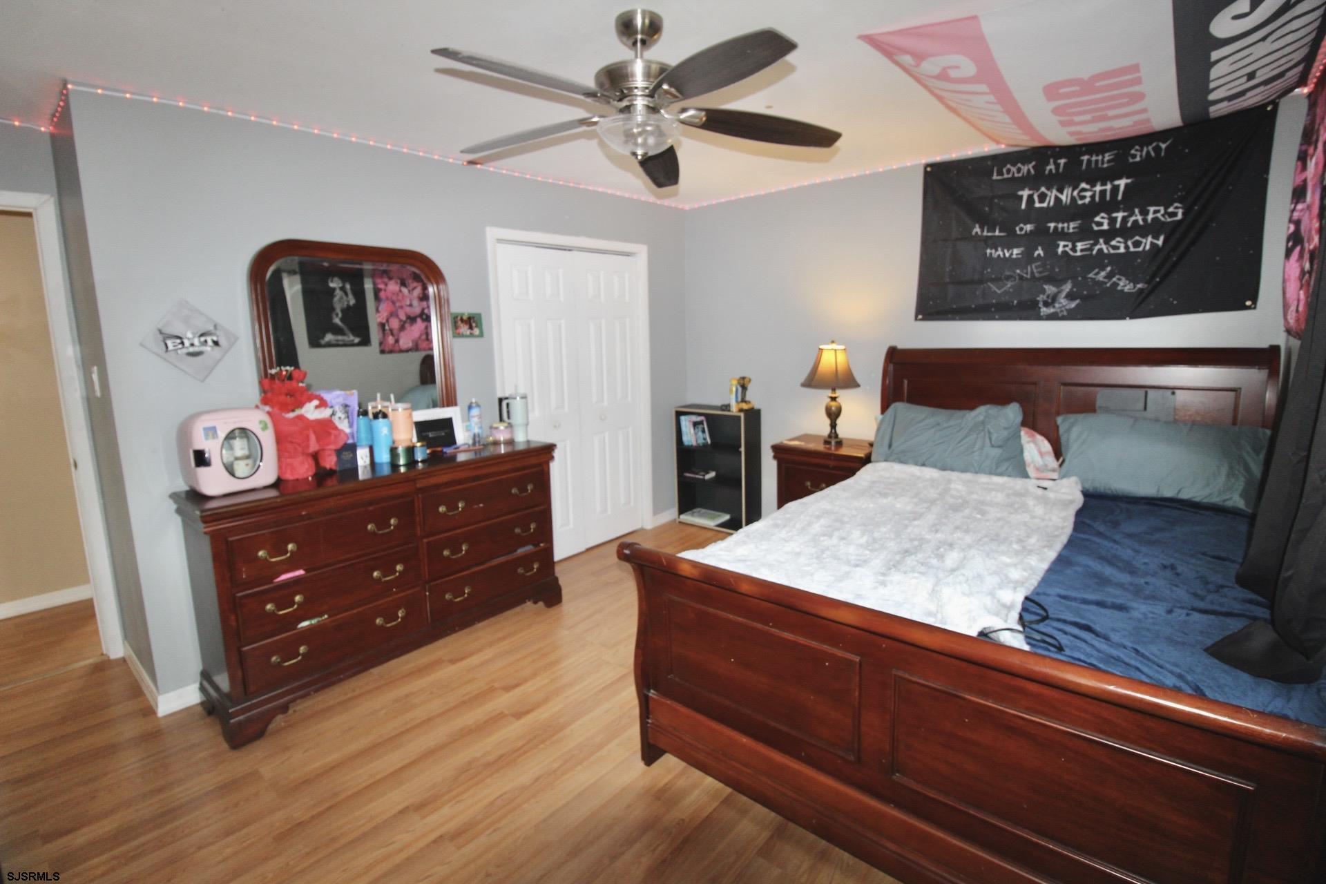 107 Spray Avenue Egg Harbor Township, NJ 08234 - Photo 28 of 38 a room with furniture and wooden floor