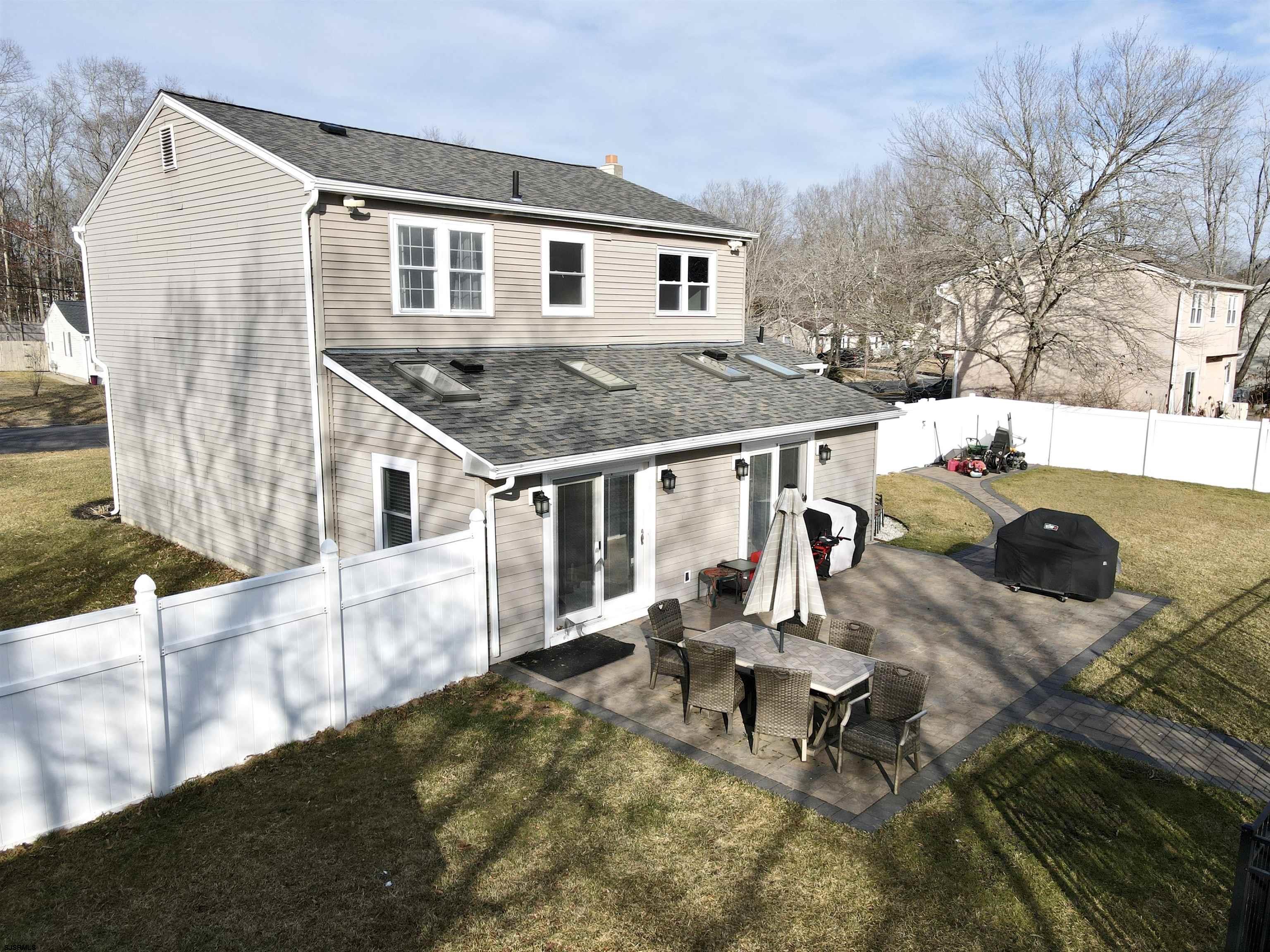107 Spray Avenue Egg Harbor Township, NJ 08234 - Photo 32 of 38 a view of a house with backyard and sitting area