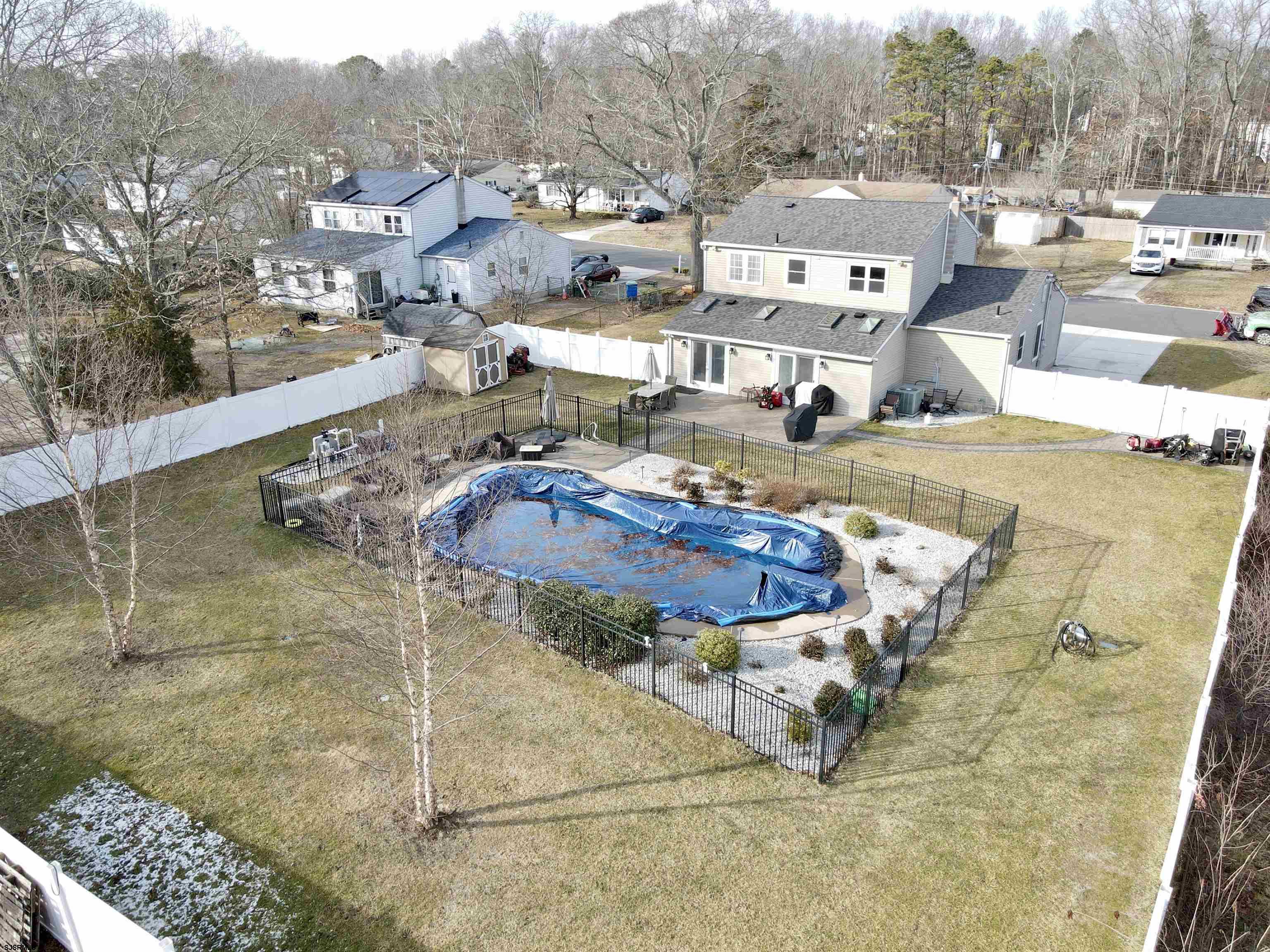 107 Spray Avenue Egg Harbor Township, NJ 08234 - Photo 38 of 38 a view of a swimming pool with outdoor seating