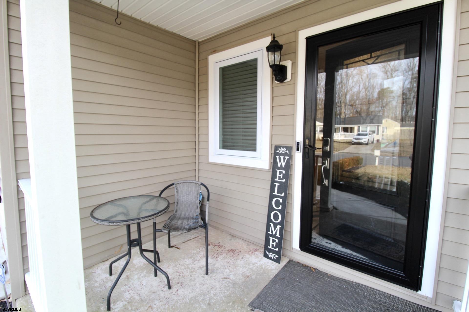 107 Spray Avenue Egg Harbor Township, NJ 08234 - Photo 4 of 38 a room with a table and chairs