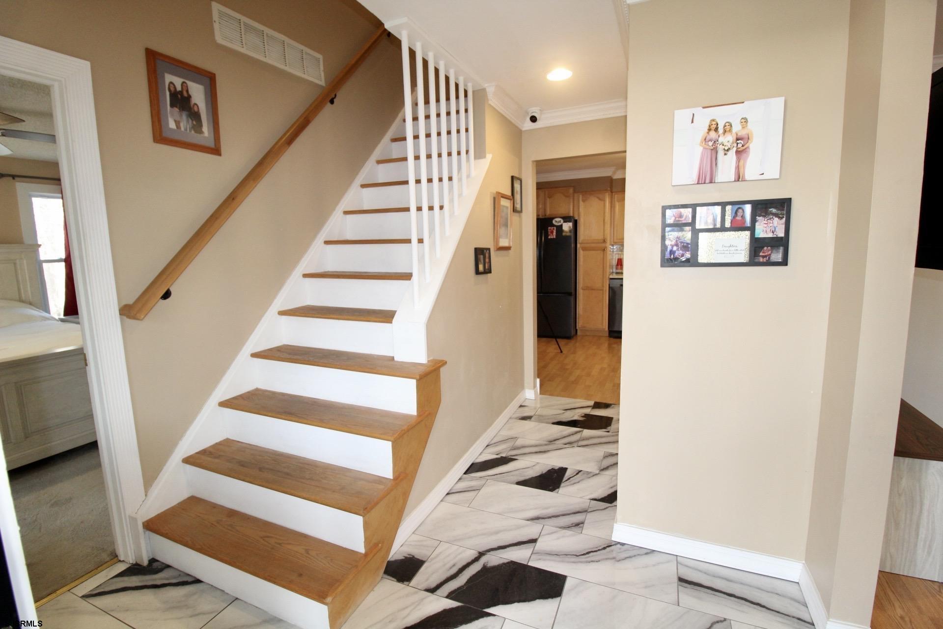 107 Spray Avenue Egg Harbor Township, NJ 08234 - Photo 5 of 38 a view of entryway with furniture and front door