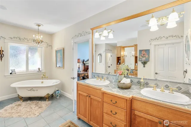 a bathroom with a sink vanity and a mirror