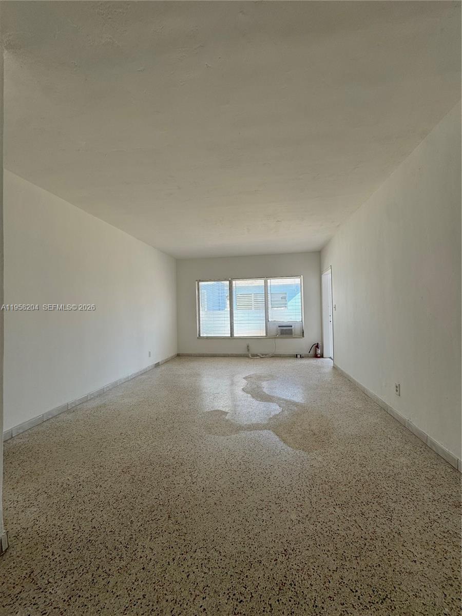 770 83rd Street Miami Beach, FL 33141 - Photo 12 of 14 a view of empty room with front door
