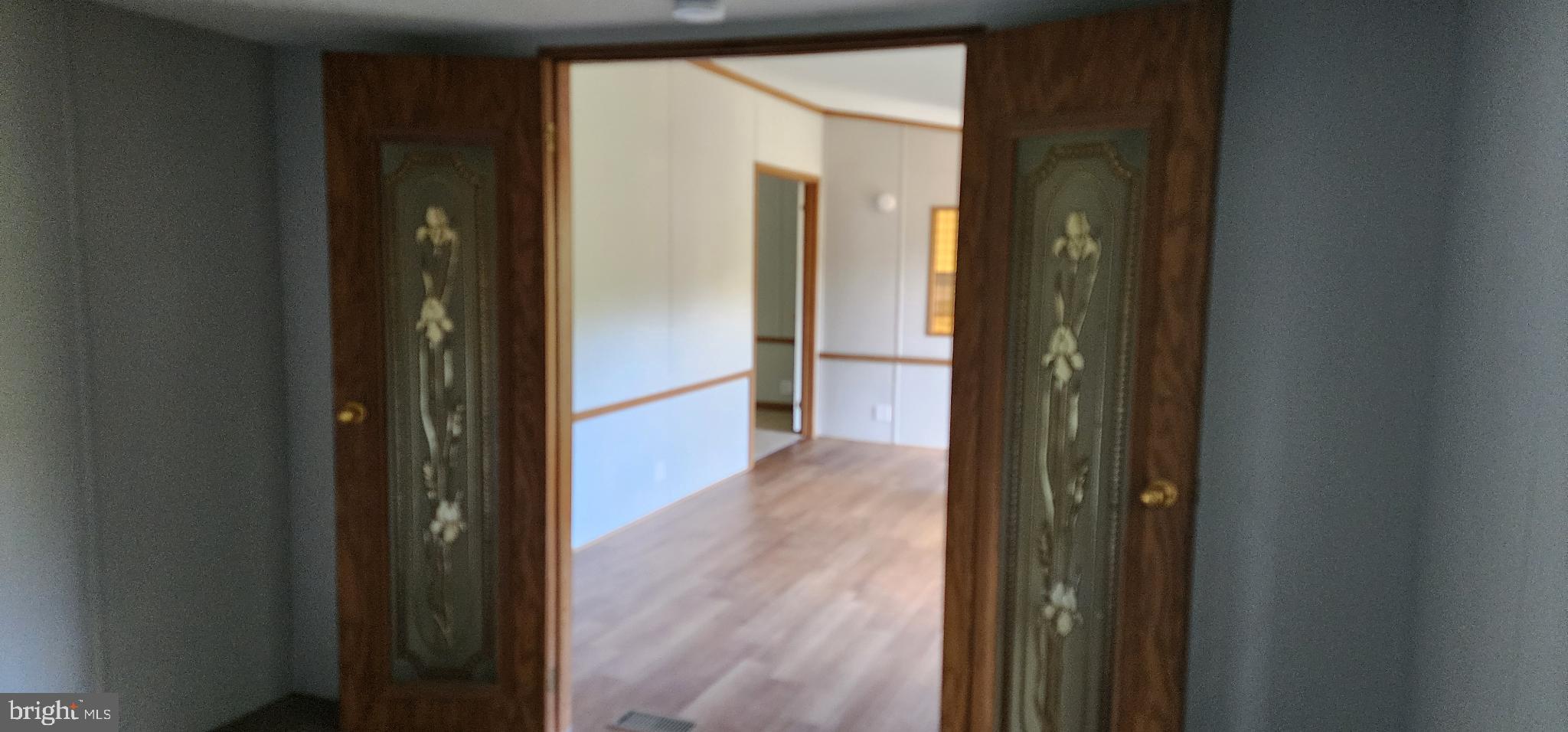 2894 Byrdtown Road Crisfield, MD 21817 - Photo 11 of 24 Inviting entryway with elegant double doors.