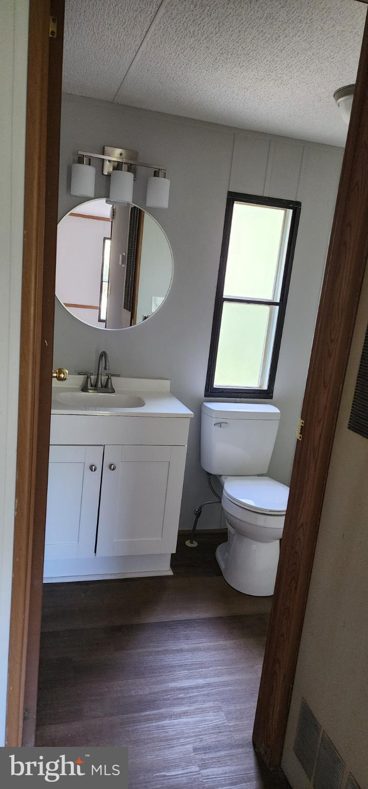 2894 Byrdtown Road Crisfield, MD 21817 - Photo 12 of 24 Bright and airy bathroom with modern touches.