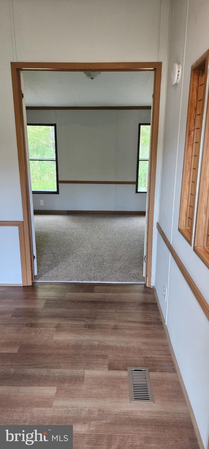 2894 Byrdtown Road Crisfield, MD 21817 - Photo 18 of 24 Inviting entryway to spacious living area.