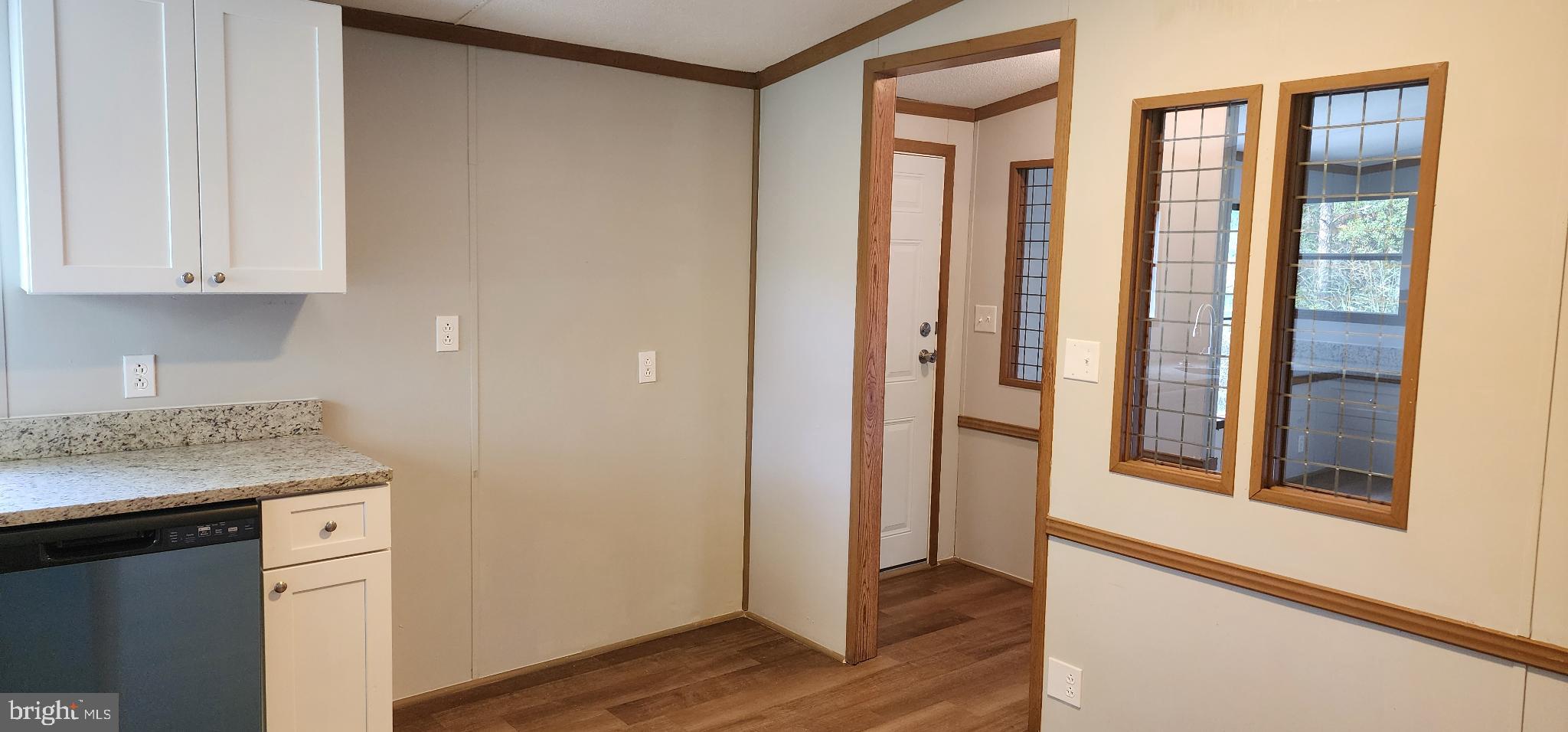 2894 Byrdtown Road Crisfield, MD 21817 - Photo 20 of 24 Modern kitchen with inviting entryway.