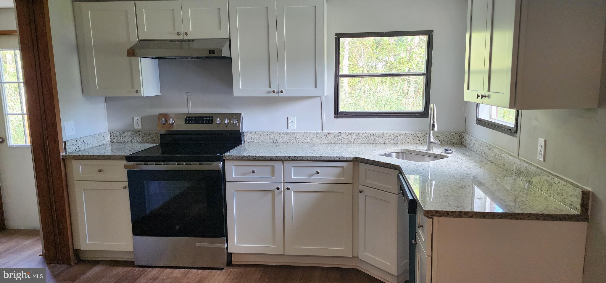 2894 Byrdtown Road Crisfield, MD 21817 - Photo 21 of 24 Modern kitchen with sleek finishes.