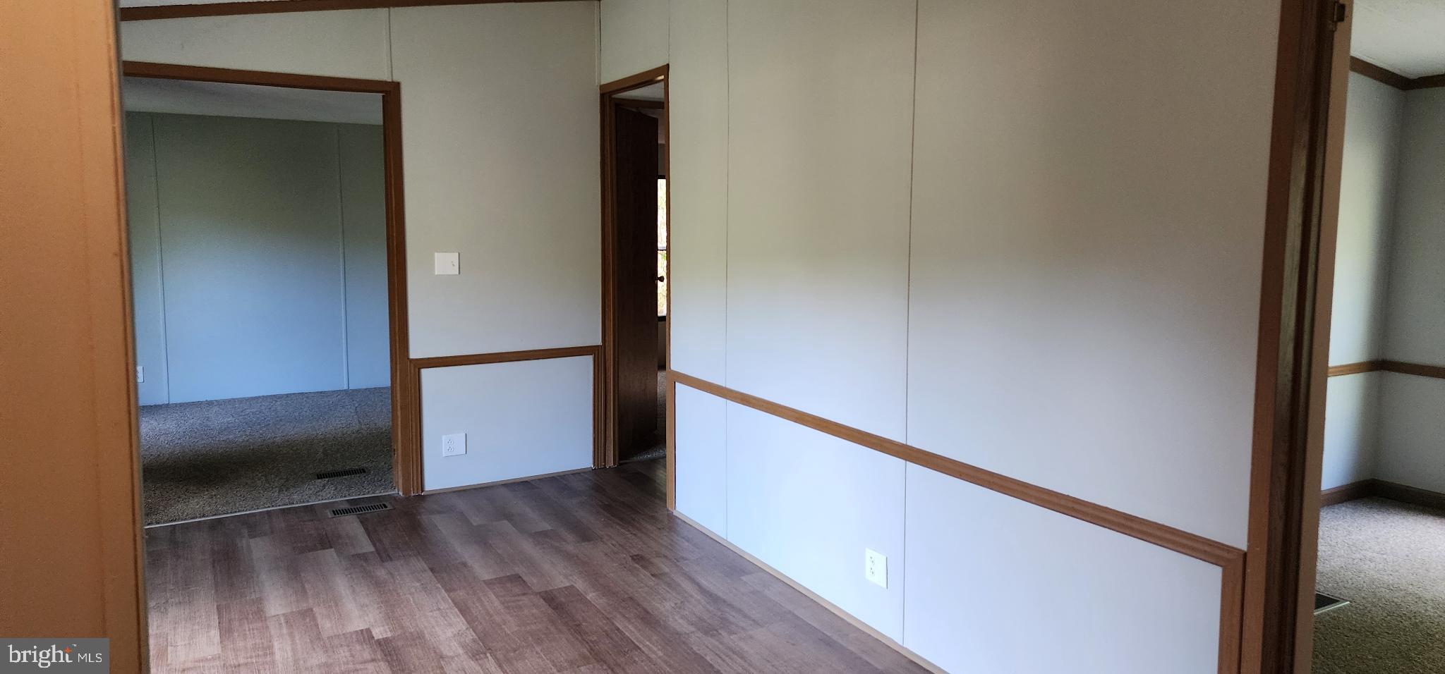 2894 Byrdtown Road Crisfield, MD 21817 - Photo 23 of 24 Spacious entryway with warm wood accents.