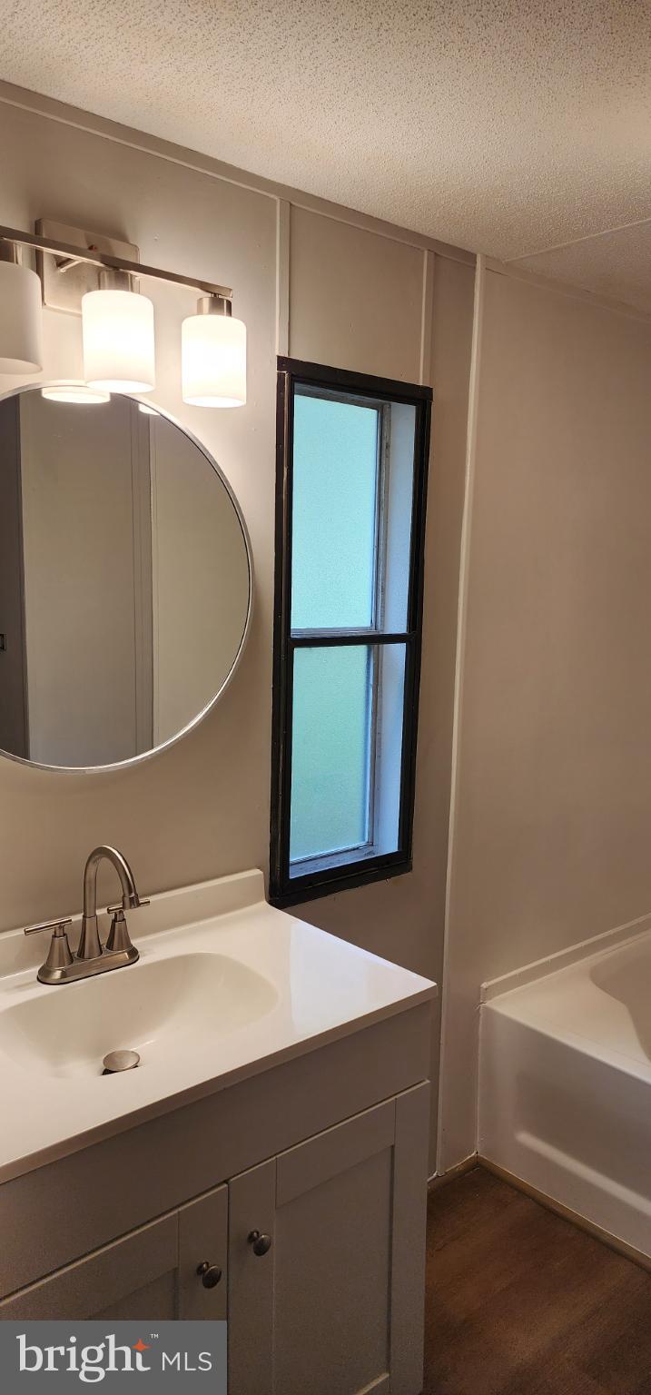 2894 Byrdtown Road Crisfield, MD 21817 - Photo 3 of 24 Modern bathroom with sleek fixtures.