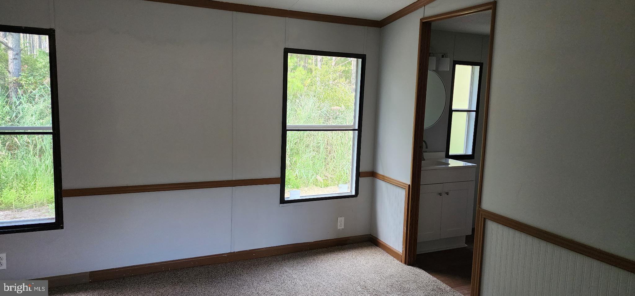 2894 Byrdtown Road Crisfield, MD 21817 - Photo 6 of 24 Bright, airy space with nature views.