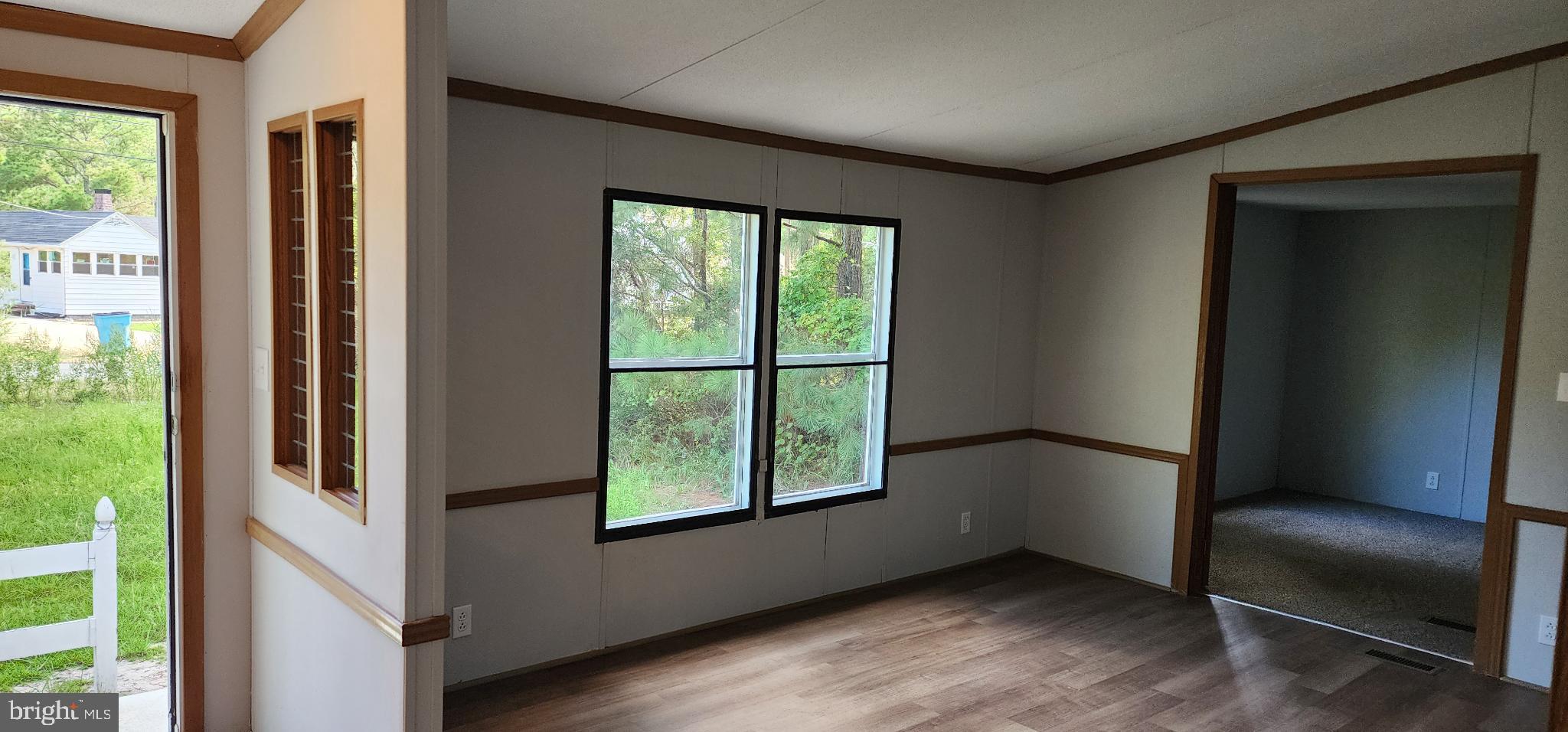 2894 Byrdtown Road Crisfield, MD 21817 - Photo 7 of 24 Bright and airy living space with nature views.