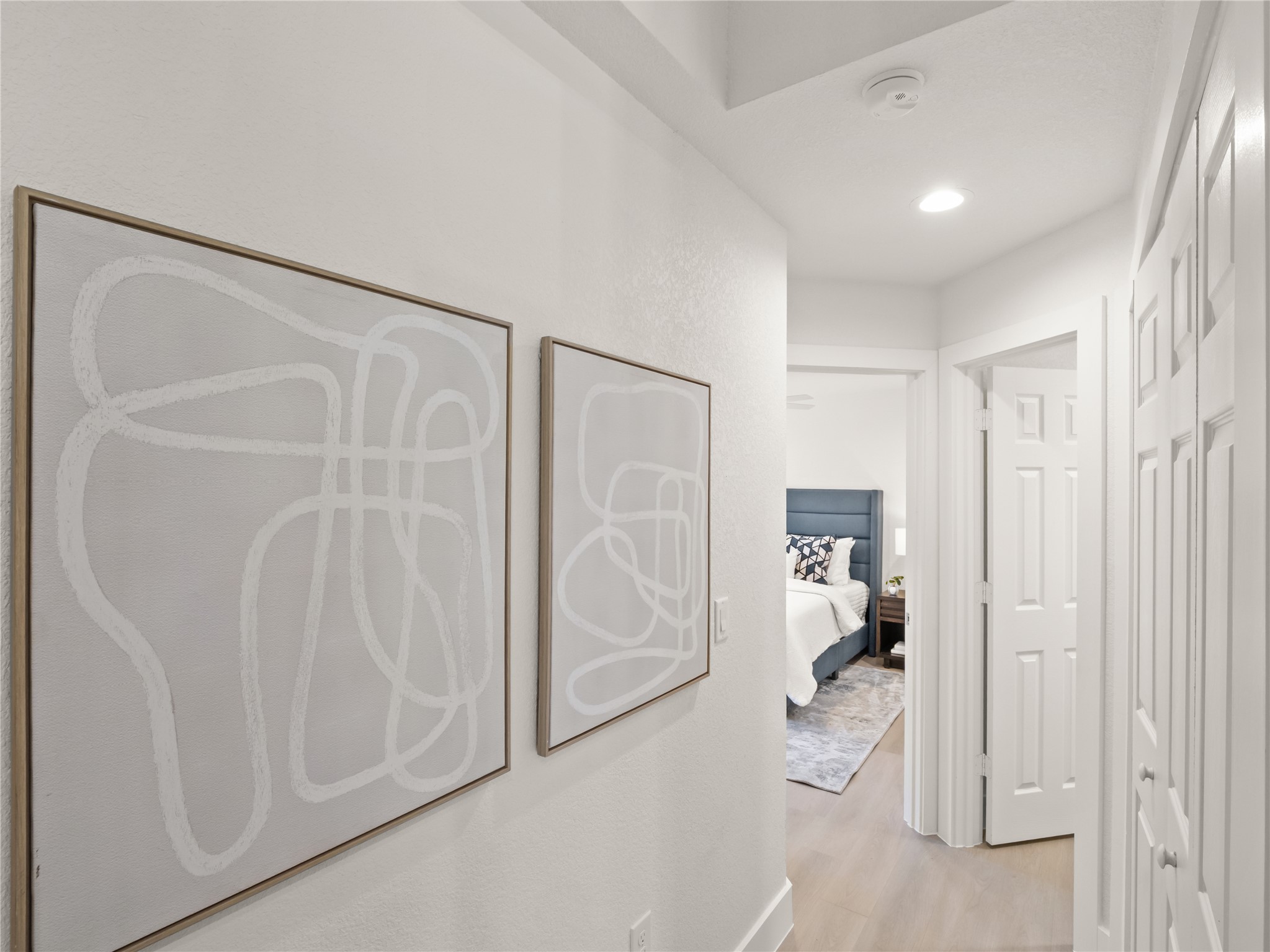 218 Crystal Knoll Boulevard Georgetown, TX 78626 - Photo 11 of 27 Corridor featuring recessed lighting and light wood-style flooring