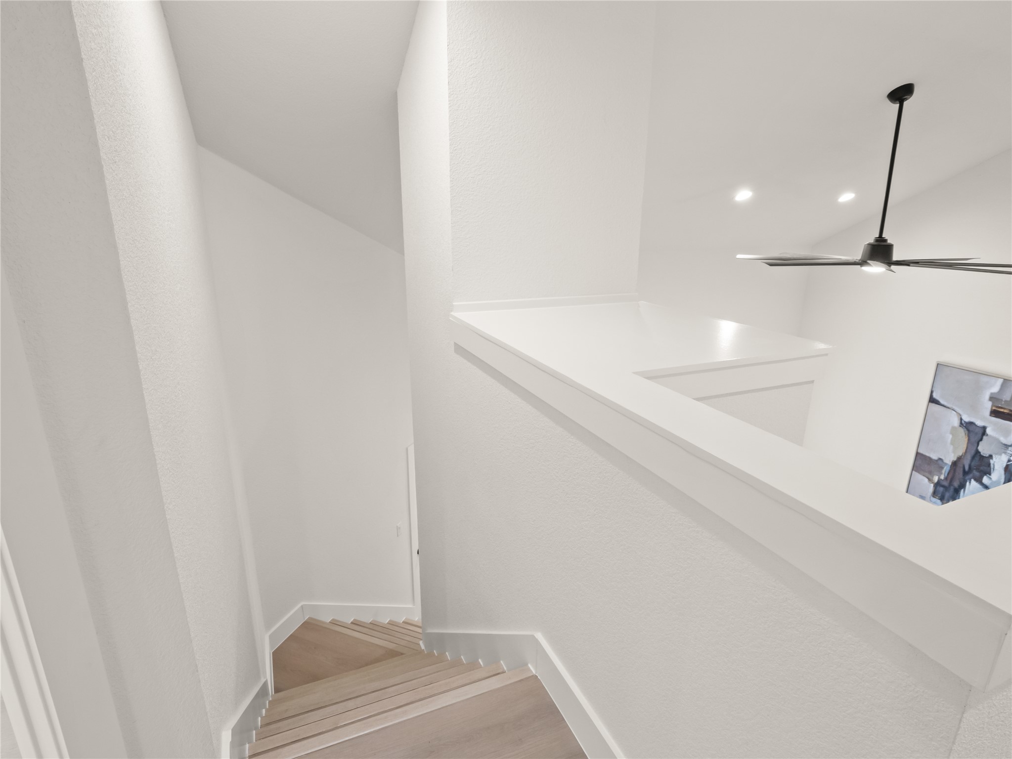 218 Crystal Knoll Boulevard Georgetown, TX 78626 - Photo 18 of 27 Staircase with a ceiling fan and wood finished floors