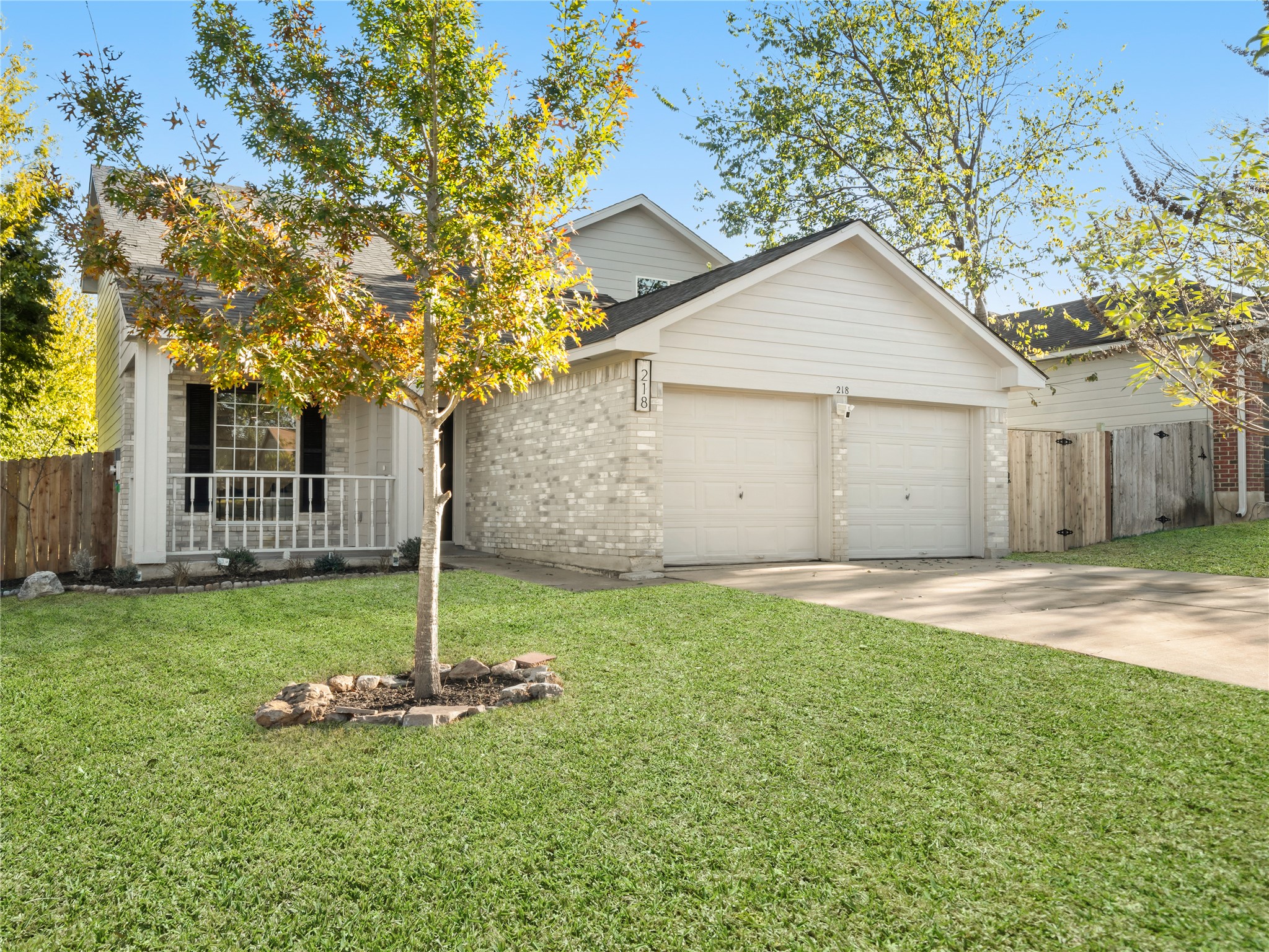 218 Crystal Knoll Boulevard Georgetown, TX 78626 - Photo 3 of 27 View of front of home with driveway, a garage, and brick siding