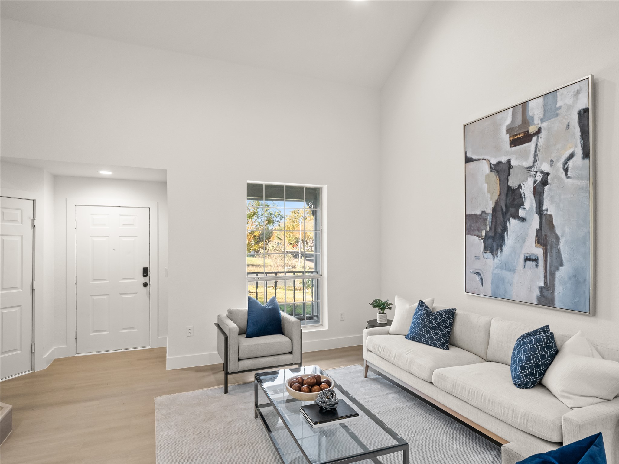 218 Crystal Knoll Boulevard Georgetown, TX 78626 - Photo 7 of 27 Living area featuring recessed lighting, wood finished floors, and high vaulted ceiling