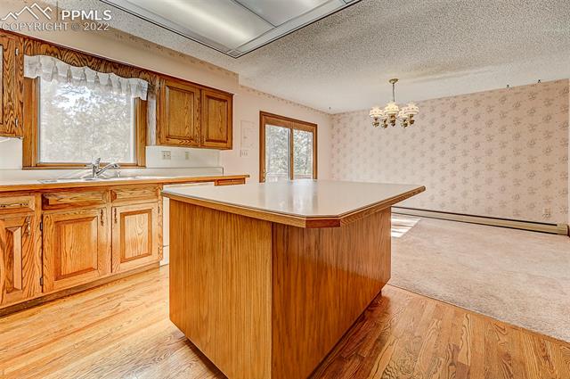 11020 Hungate Road Colorado Springs, CO 80908 - Photo 8 of 42 kitchen