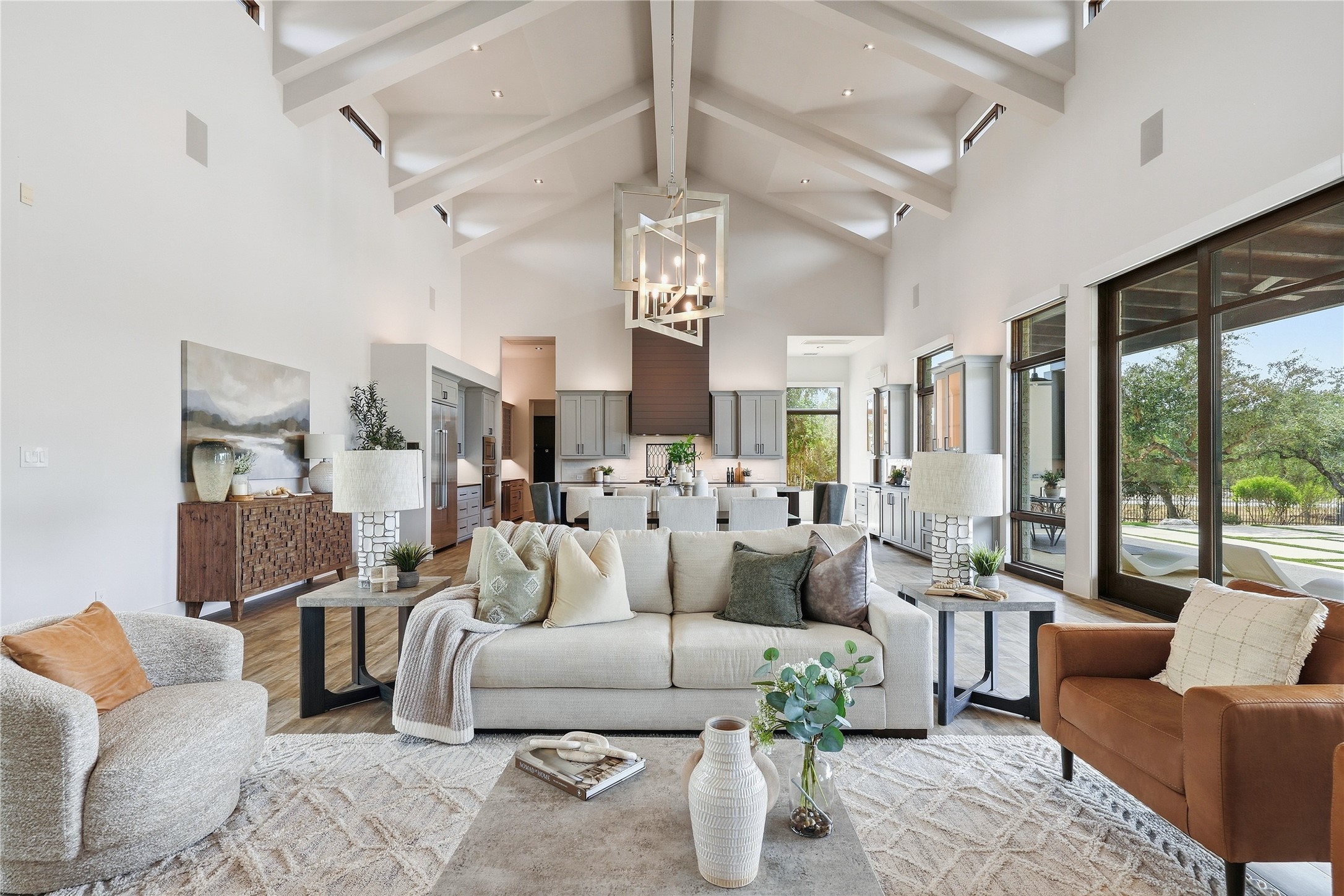 449 Ranch Falls Fair Oaks Ranch, TX 78015 - Photo 5 of 39 Dramatic vaulted ceilings with exposed beams crown this open and airy living space.