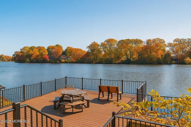 a view of a lake and sunset