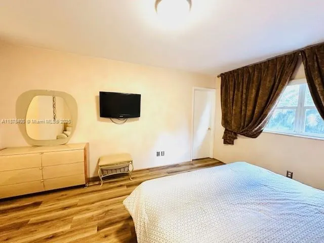 a view of a livingroom with furniture and a fireplace