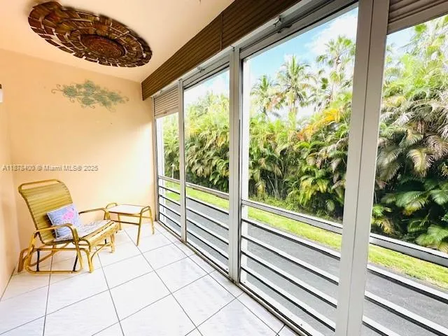 a view of a swimming pool with a yard