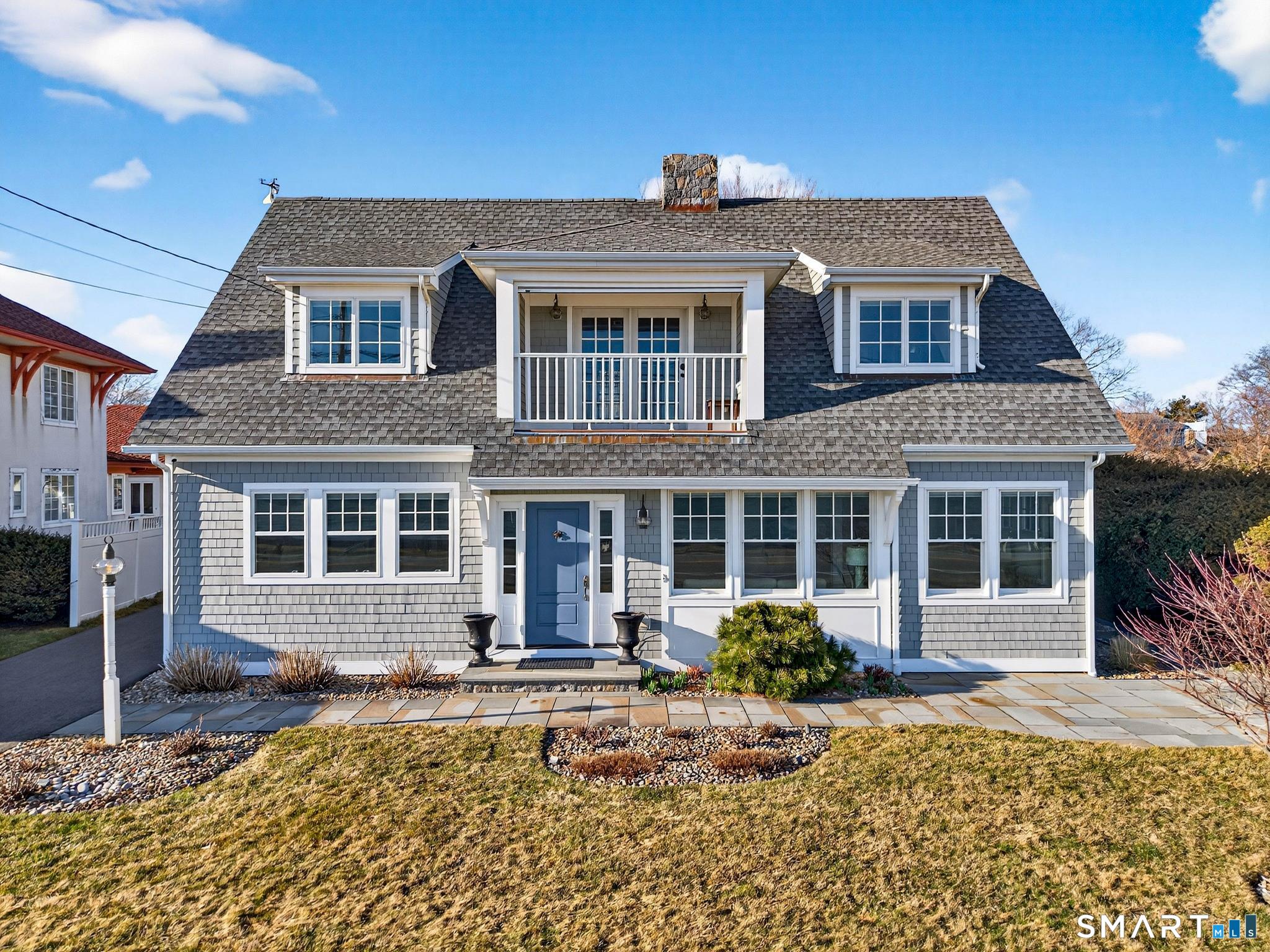 382 Maple Avenue Old Saybrook, CT 06475 - Photo 2 of 42 a front view of a house with garden