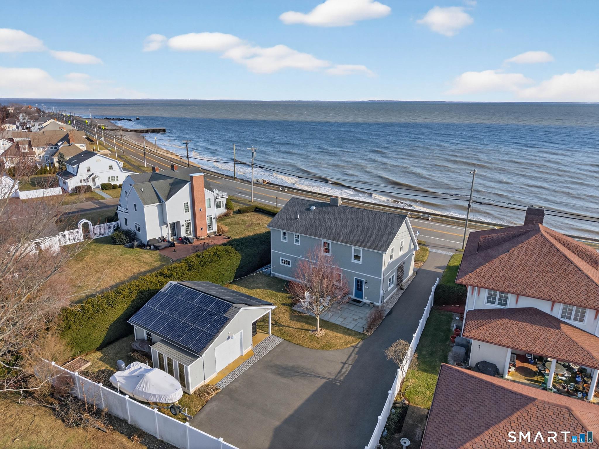 382 Maple Avenue Old Saybrook, CT 06475 - Photo 39 of 42 an aerial view of a house with a ocean view